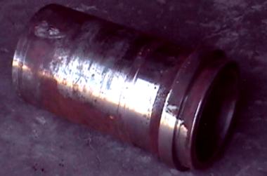 Heavy wear on a mud pump component.